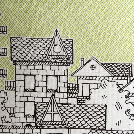 Coussin décoré avec un dessin d'une ville,de vert et de blanc