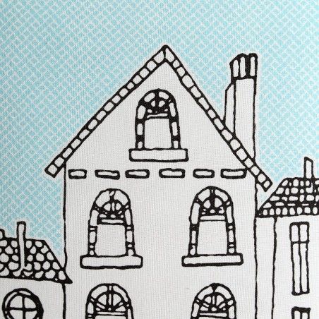 Coussin décoré avec un dessin d'une ville bleue et blanche