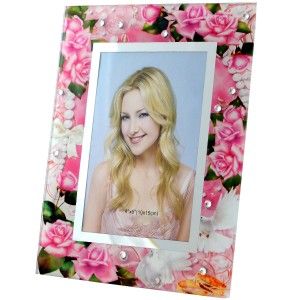 Photo frame in glass with floral motifs