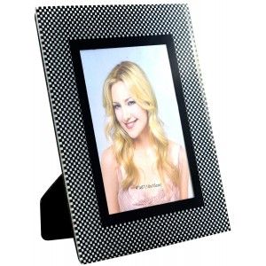Photo frame in glass with decorative motifs in black-and-white.